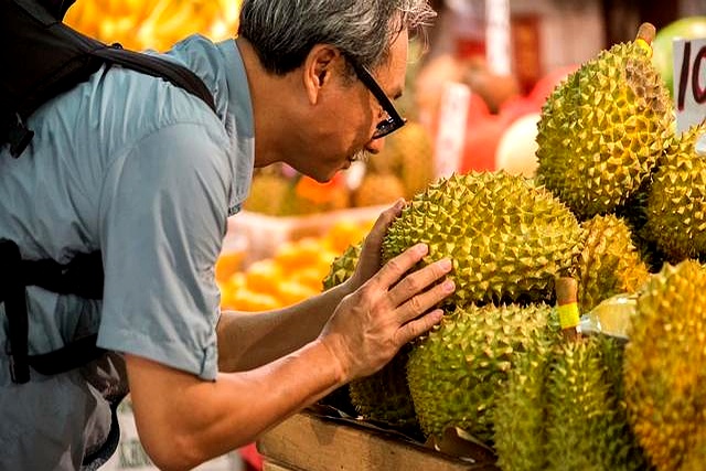 泰国中国零食_泰国榴莲价格歧视_中国游客泰国榴莲体验